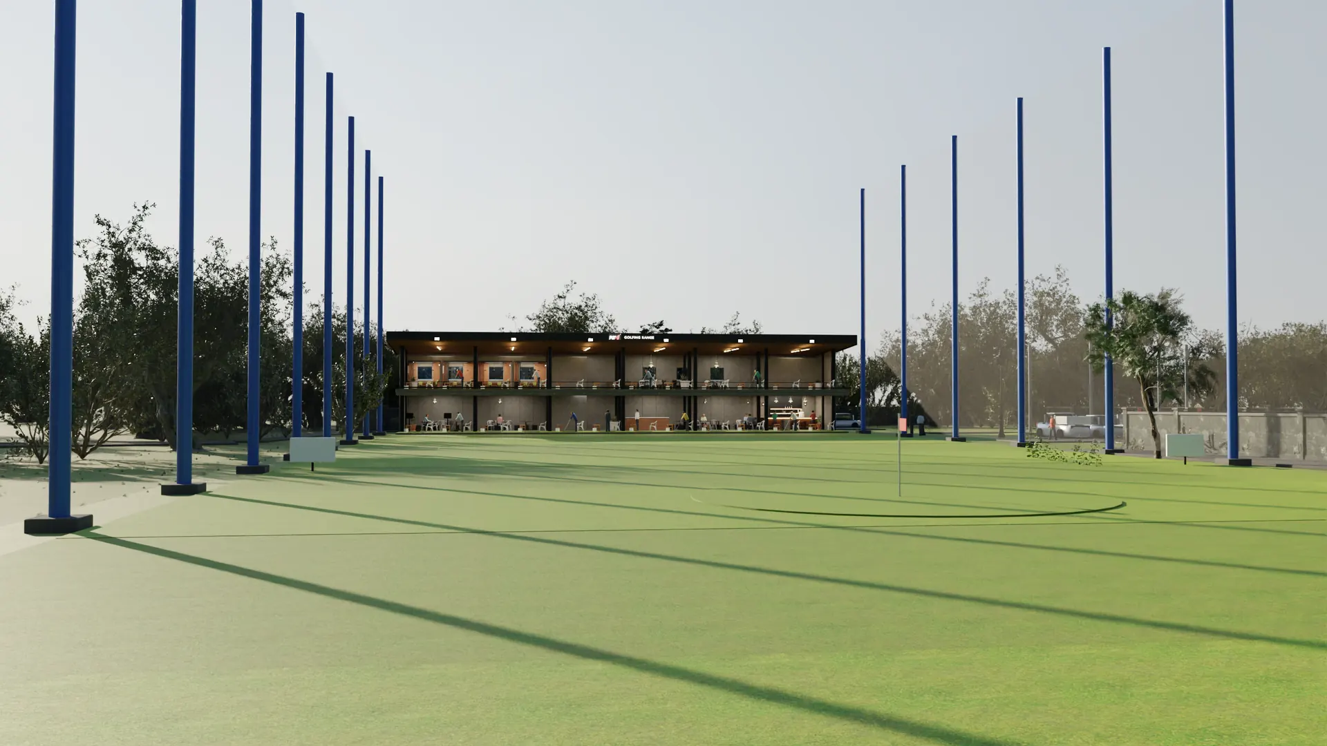 Looking back at the tee line from a hundred metres out, both net runs converging