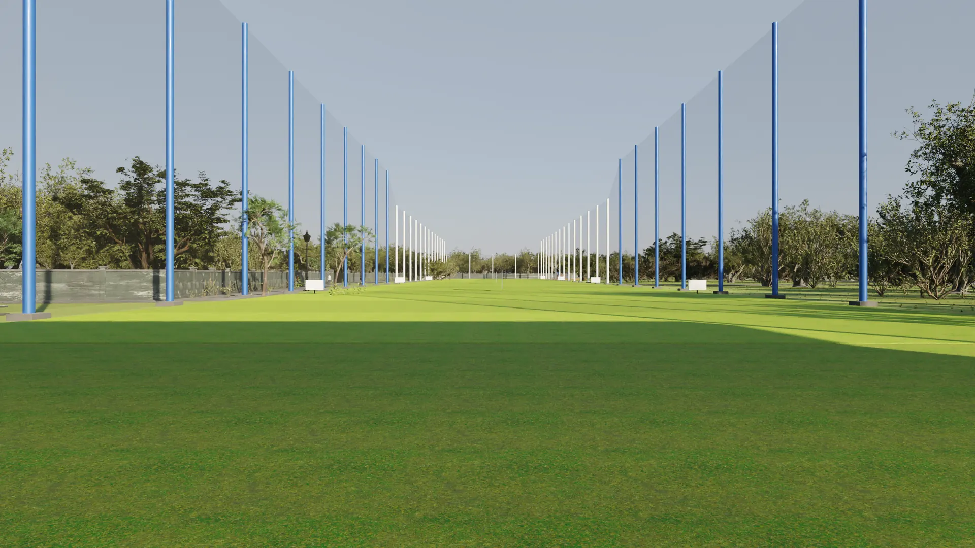 A golfer's view from a ground-floor bay, straight down the outfield, posts receding